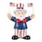 Glitzhome® 9" Patriotic Americana Polyresin Santa Holding Flags Table Decor